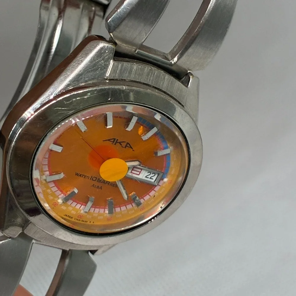 Vintage Seiko Alba AKA V743-5A10 Men's Quartz Watch Orange Dial 10BAR